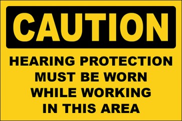Hinweisschild Hearing Protection Must Be Worn While Working In This Area · Caution | selbstklebend